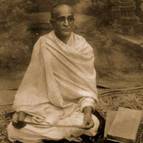 Srila Bhaktisiddhanta giving lecture