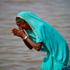 Woman Offering Respects to Mother Ganga