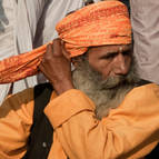 Sadhu Putting on a Turban