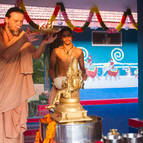 Giir Maharaja performing arati of Laksmi-Narasimha