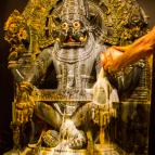 The beginning of Lord Narasimha's main abhiseka at twilight